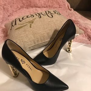 #71 Katy Perry Black with Gold heel size 7
